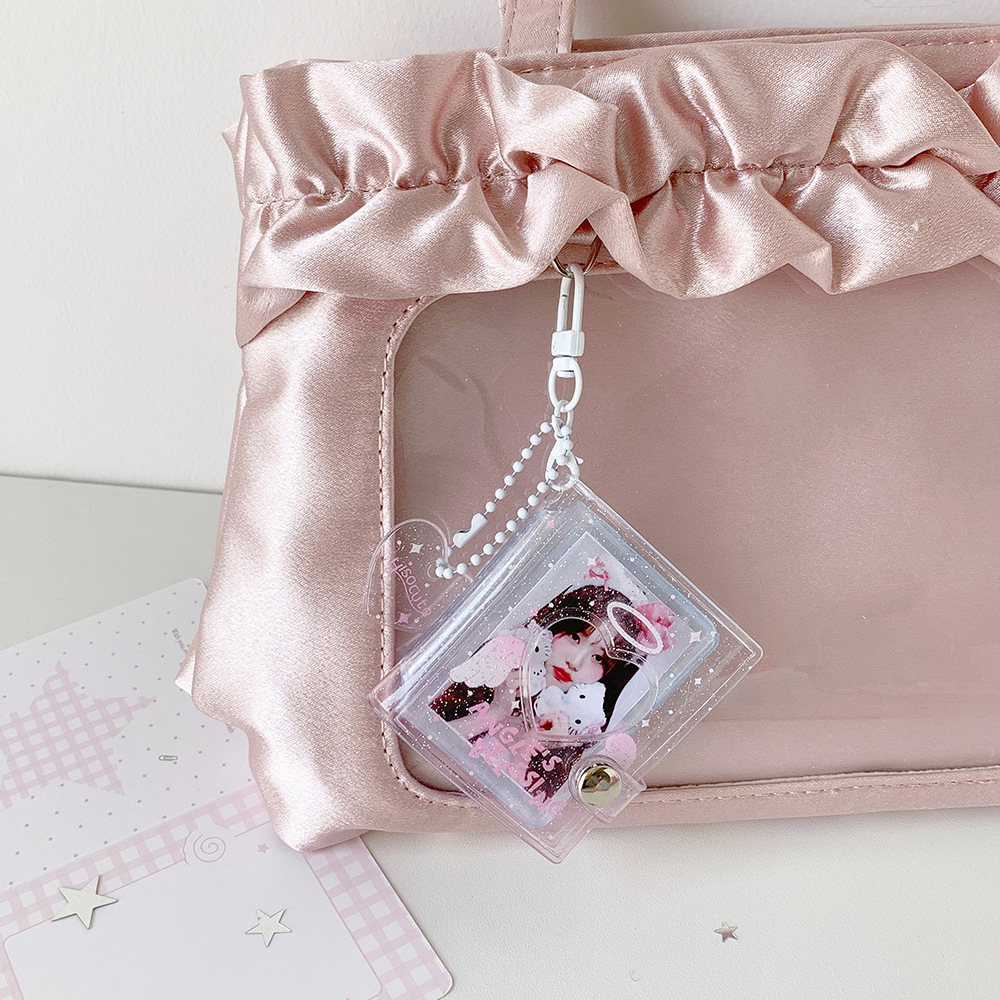 سلسلة مفاتيح ألبوم صور كرتونية - مراجعة Polaroid Photo Album وسعره